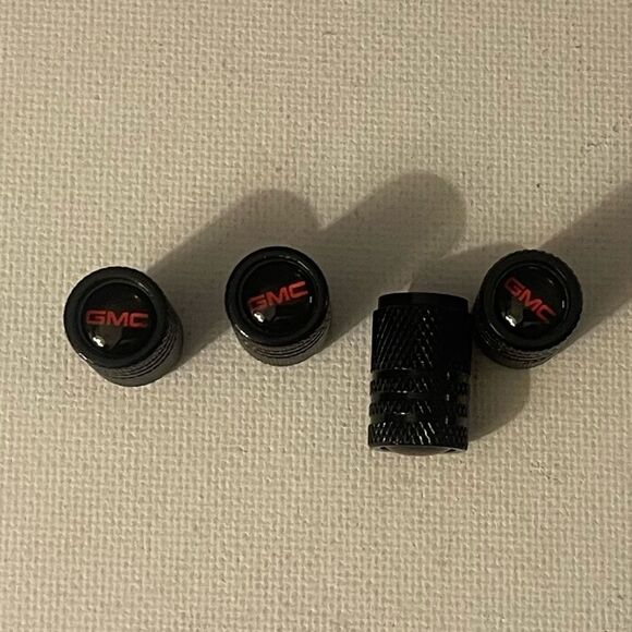 GMC Logo valve Stem caps in Black set of 4 NWT - Picture 1 of 4